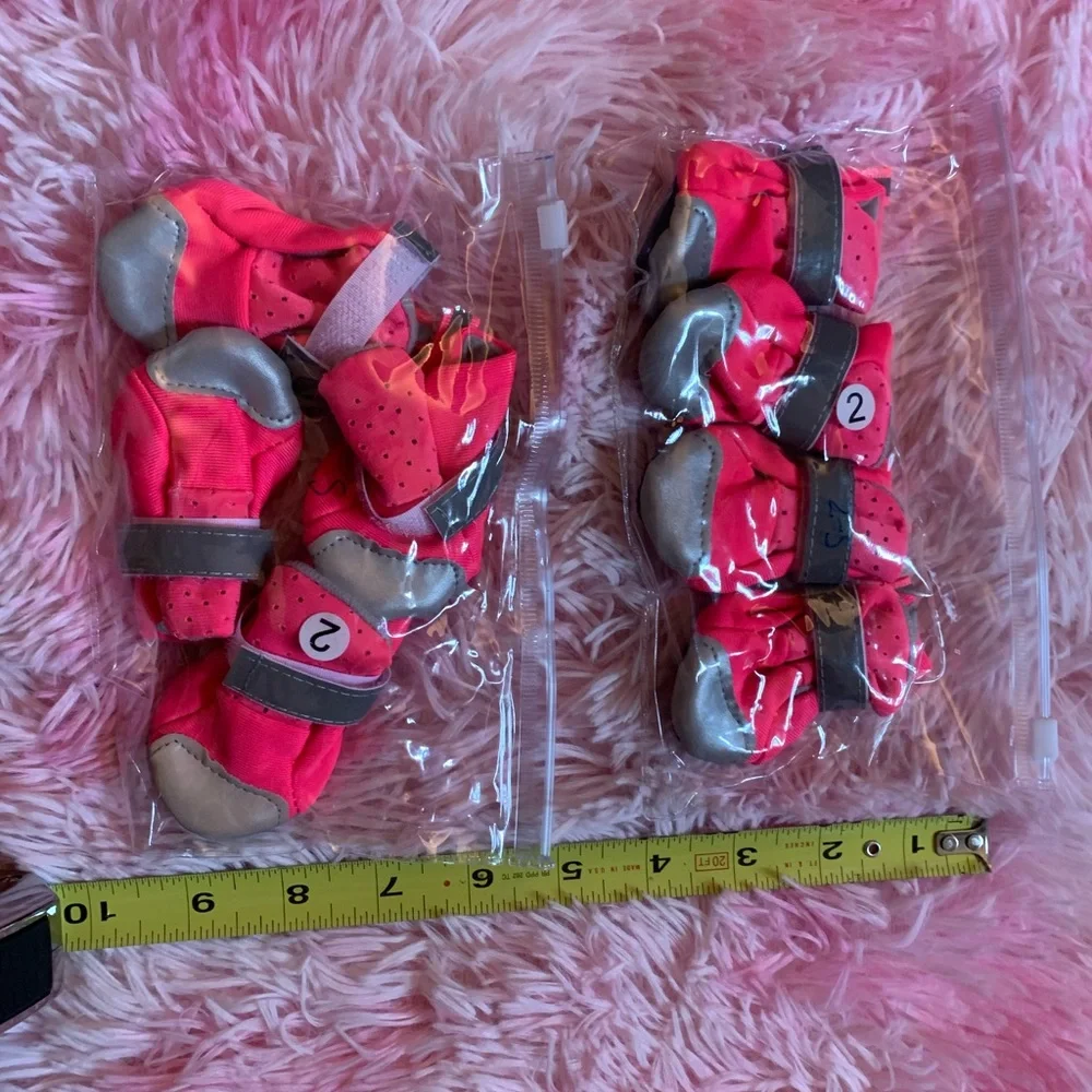 NWT Stylish Pink and Silver Size 2 doggie booties. 4 count.